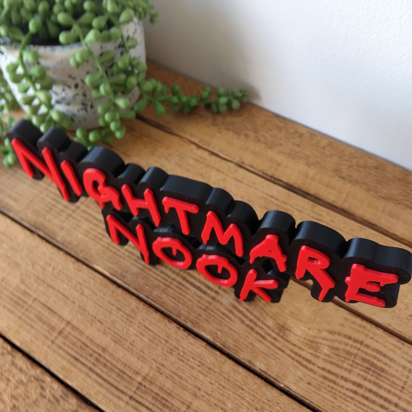 Nightmare Nook Sign