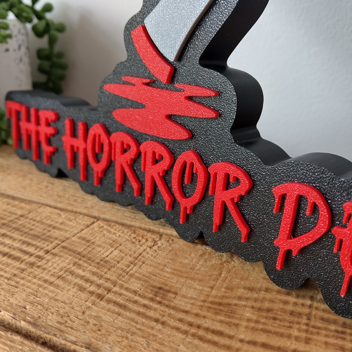 The Horror Den Sign