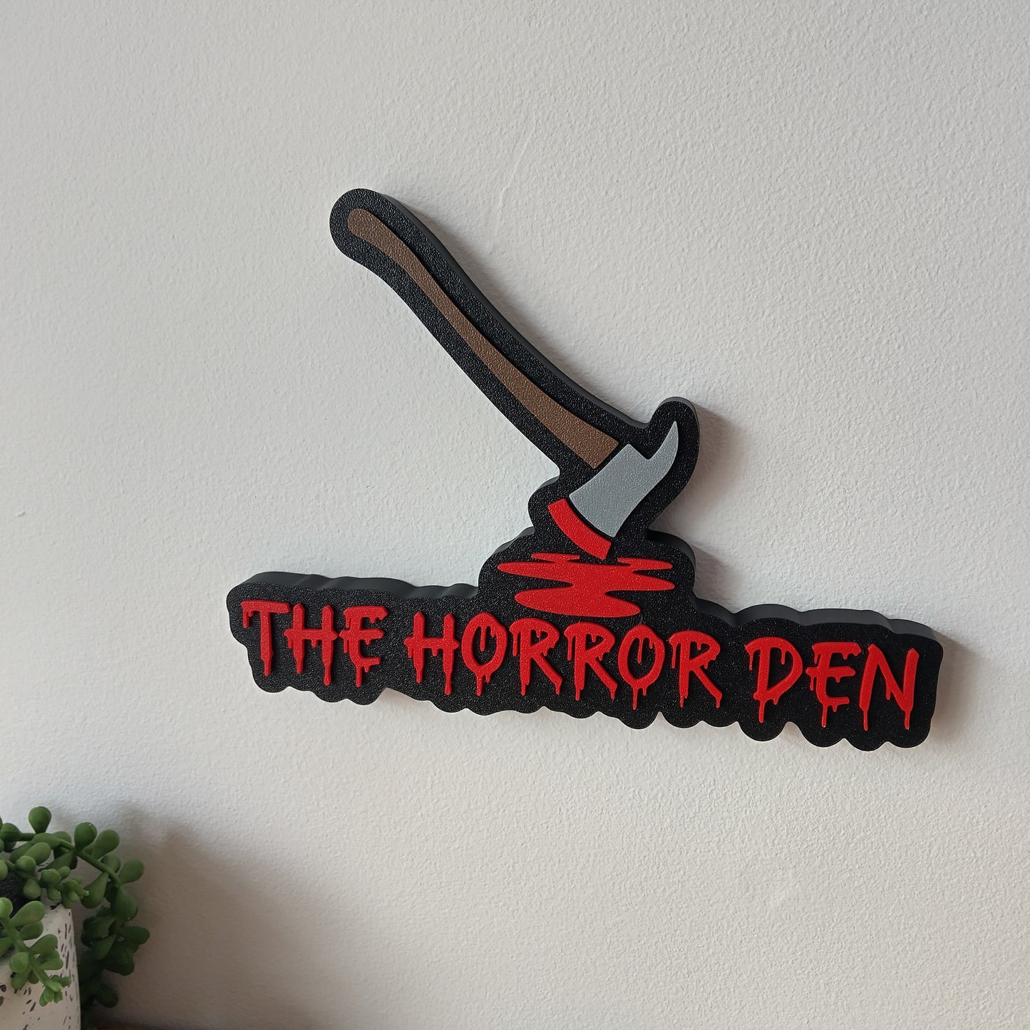The Horror Den Sign