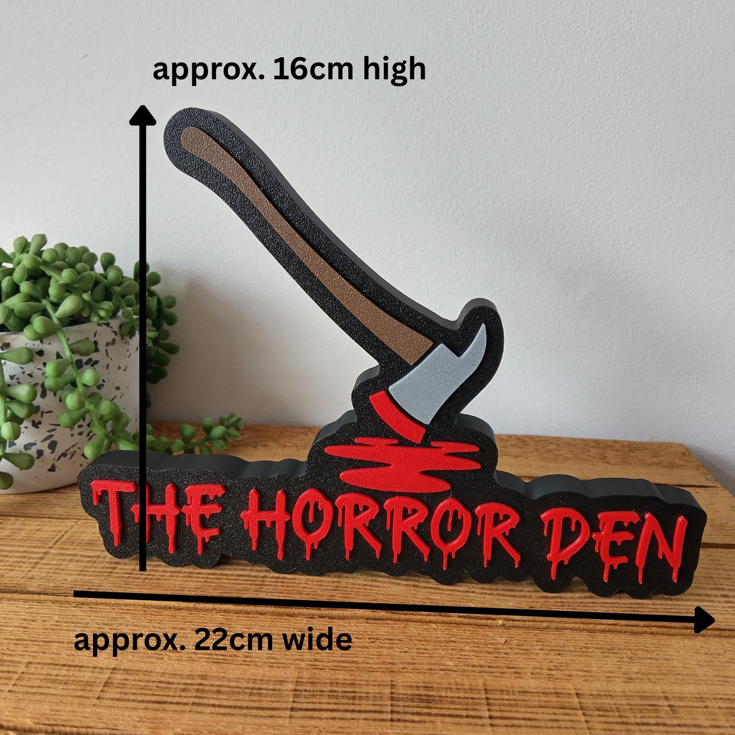The Horror Den Sign
